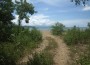 En este trecho de la bahía de Salinas la costanera lleva hasta la bella playa. Al fondo se aprecio la costarricense isla Bolaños.