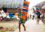 Niños de la comunidad de Rama Cay, en la Región Autónoma de la Costa Caribe Sur de Nicaragua, ayudan a cargar los baldes que forman parte de los filtros de agua para llevar agua potable a su comunidad. (Foto: OSC-Nicaragua).