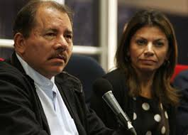 Daniel Ortega y Laura Chinchilla. Sus rostros lo dicen todo.