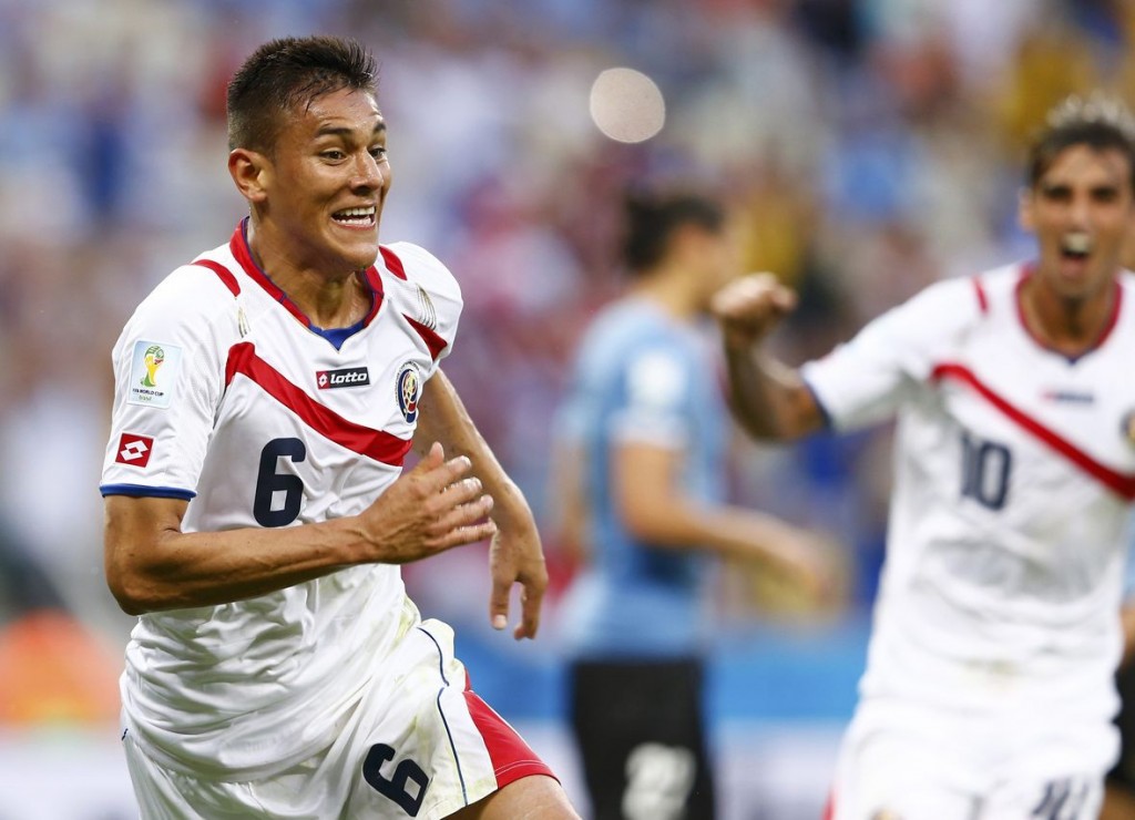 Costa Rica's Oscar Duarte celebrates after scoring against Uruguay during their 2014 World Cup Group D soccer match at the Castelao stadium in Fortaleza